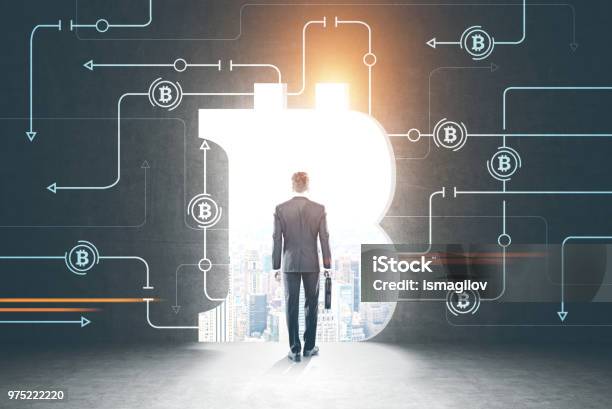 Businessman Entering Bitcoin Market Rear View Stock Photo - Download Image Now - Journey, Adult, Bitcoin
