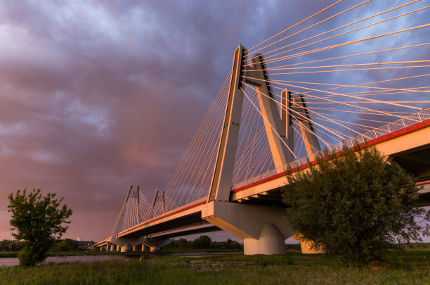 istock Cable stayed bridge, Krakow, Poland, during sunset over Vistula river 975226234