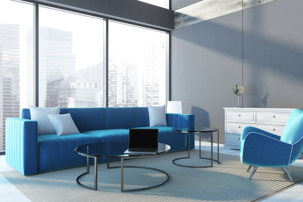 istock Panoramic penthouse living room corner blue sofa 975227056