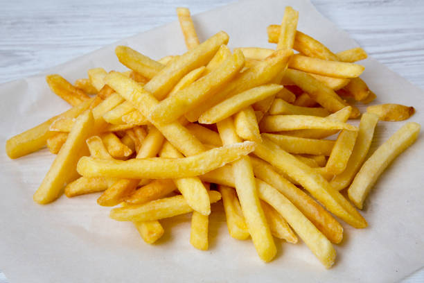 istock French fries, closeup. Side view. 975233462