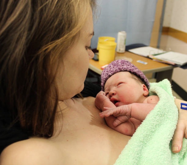 istock Young Mom and Newborn Just Born Childbirth 975242532