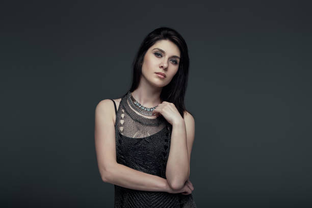 istock Portrait brunette attractive woman, accent on arms 975247728