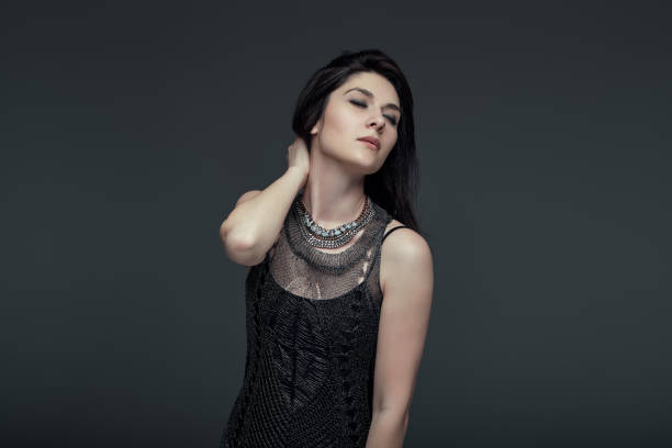 istock Portrait brunette attractive woman, accent on arms and face expr 975247896