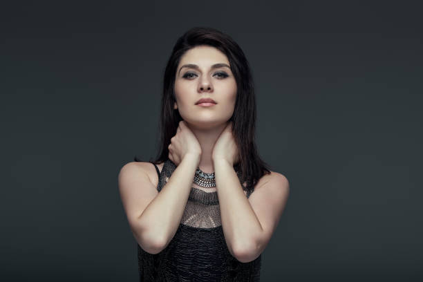 istock Portrait brunette attractive woman, accent on arms 975248024