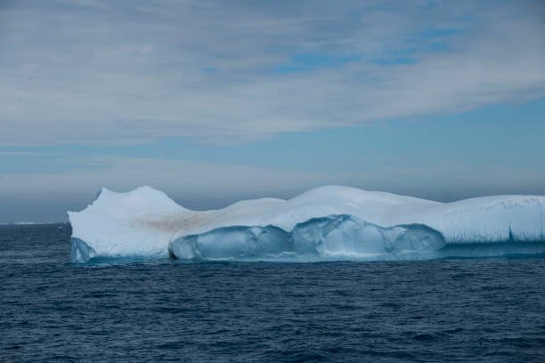istock Beautiful Antartica mountains and ocean water 975256404