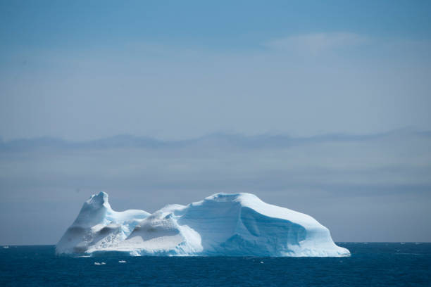 istock Beautiful Antartica mountains and ocean water 975256566