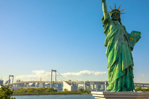 istock Statue of Liberty and Rainbow Bridge 975259608