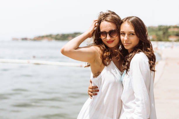 istock happy friends together in summer 975279580