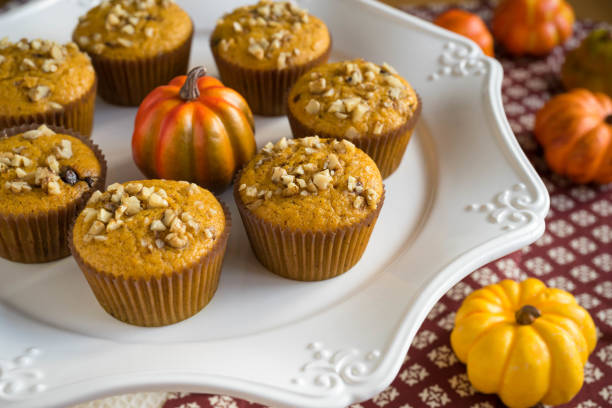 istock Homemade Autumn Pumpkin Muffins 975284136