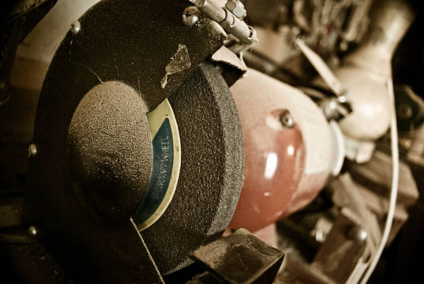 istock Closeup of grinding wheel in dusty old tool shed 97530629