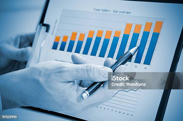 Person Showing A Good And Successful Annual Report Stock Photo - Download Image Now - Achievement, Adult, Aiming