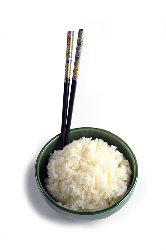Bowl of Steamed Rice with Chopstick Isolated on White Background.