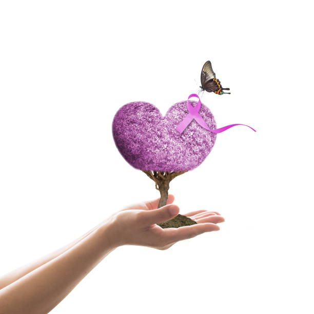 światowy dzień raka i narodowy miesiąc ocalałych z raka z lawendową fioletową wstążką na drzewie serca - cancer victim zdjęcia i obrazy z banku zdjęć