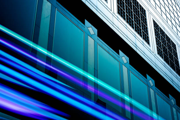 istock double exposure with traffic light and Modern office building 975385766