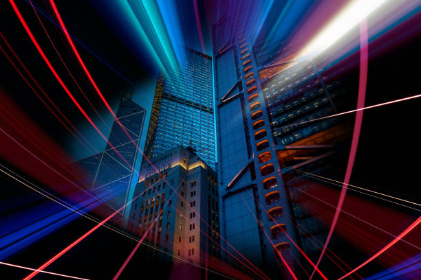 istock double exposure with traffic light and Modern office building 975385814