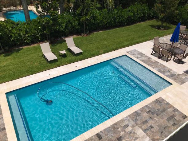 istock Swimming pool in the backyard of house 975402242