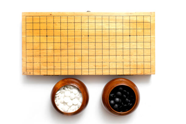 istock The ancient Chinese strategy board game isolated on white 975404502
