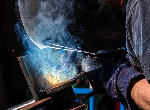 Tig welding dual core plasma flux blasts of energy, light, smoke, sparks, and flame creation