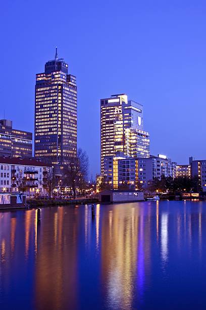 istock Office buildings along the Amstel in Amsterdam Netherlands 97544130