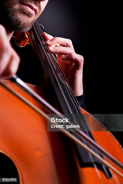 Cellist Playing In Studio Stock Photo - Download Image Now - Backgrounds, Cellist, Cello