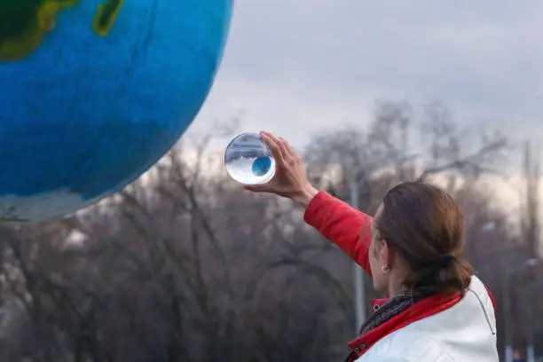 Photo of Contact juggling. Performance on street