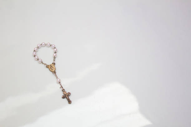 Rosary of pearls in white  background