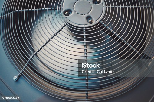 istock Air conditioner unit with fan running 975500378