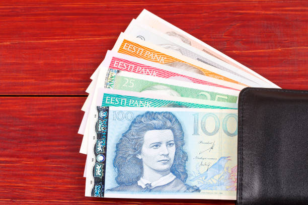 istock Money from Estonia in the black wallet 975505776