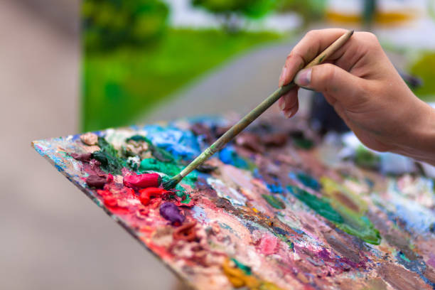 istock Artist paint summer park 975512320