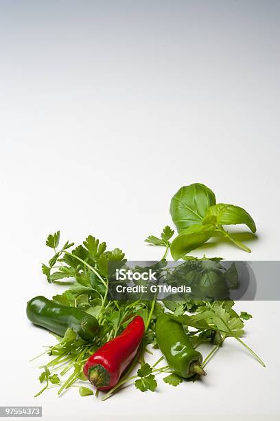 Red And Green Chillies With Parsley Basil Stock Photo - Download Image Now - Burning, Chili Con Carne, Color Image