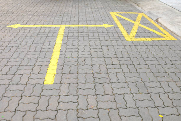 istock The yellow junction mark on the concrete floor. 975565632