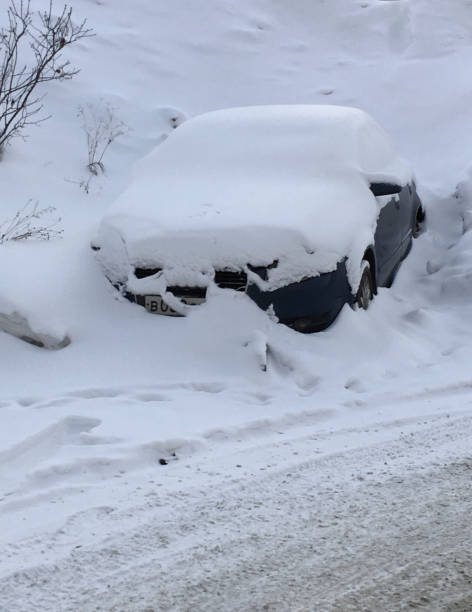 istock A car covered with a large layer of snow 975580758
