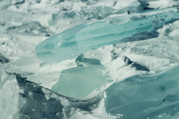 istock ce floes in the snow. lear frozen water. 975580778