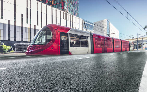 istock sydney lightrail driving by empty tarmac road 975581252