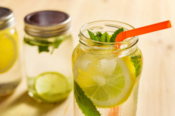 istock refreshing lemonade with lemon and mint leaves 975583778