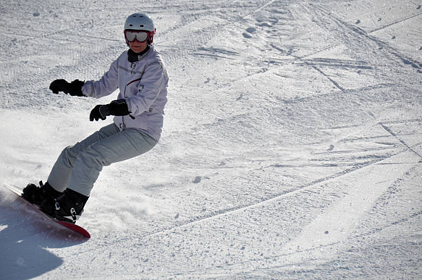 istock Female snowboarder in powder snow 97558391