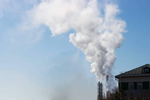 istock white smog from the factory pipe in the sky 975592596