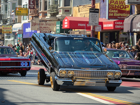 SAN FRANCISCO, CA – MAY 27, 2018: Man demonstrating his hydraulic low rider at the Carnaval Grand Parade in San Francisco’s Mission District