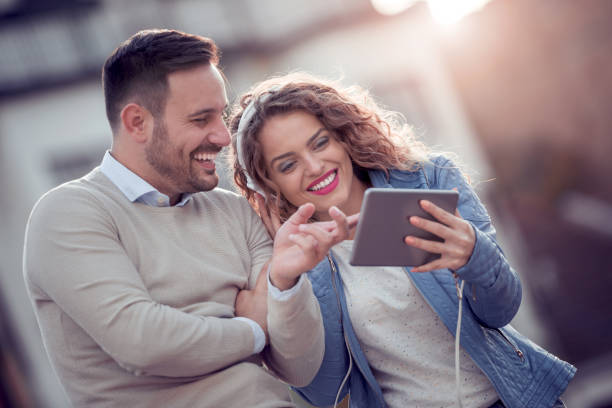 istock Happy young couple having fun outdoors 975612508
