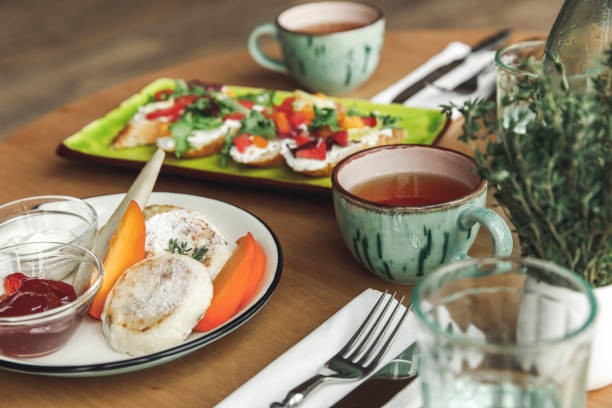 istock close-up view of delicious healthy breakfast with tea on table 975615212