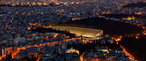 Illuminated Panathinaiko stadium in Athens, Greece at night
