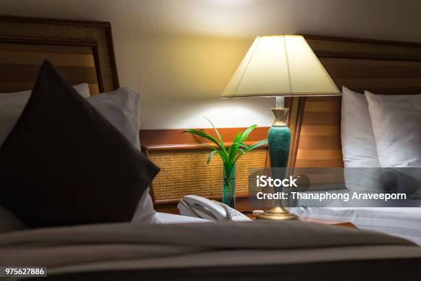 Bed And Nightstand In Modern Bedroom And Equipment For A Comfortable And Restful Experience Stock Photo - Download Image Now