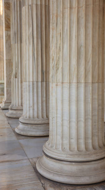 istock Classical marble pillars on the facade of a building 975629378