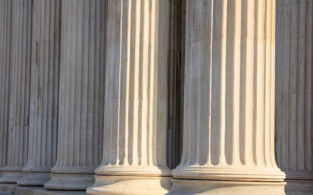 istock Classical marble pillars on the facade of a building 975631836