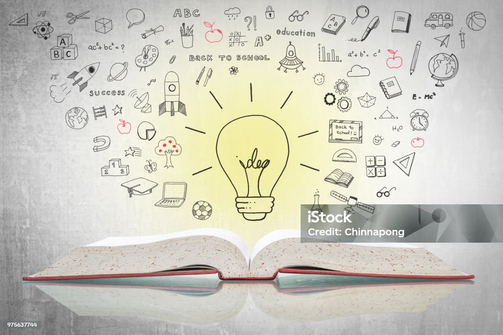 World intellectual property day and education concept with innovative light bulb on book with doodle Day Stock Photo