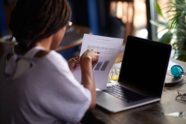 istock Woman with papers 975637826