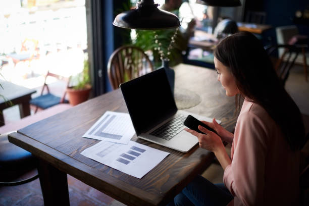 istock Woman in coworking space 975637996