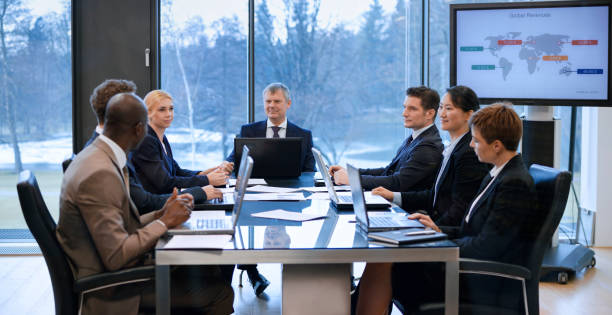 istock Business people having meeting 975638194