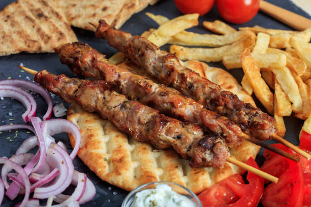 istock Grilled meat skewers 975638392