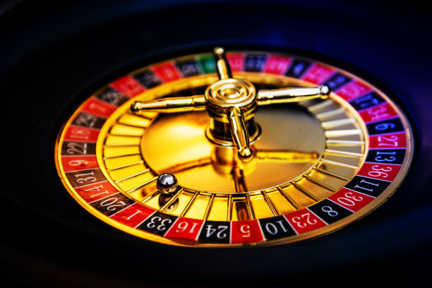istock Casino playing roulette on green table 975642372